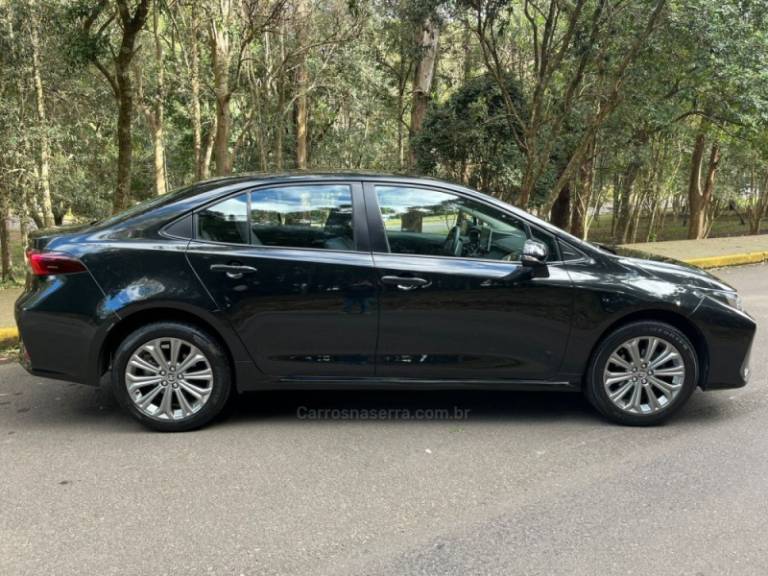 TOYOTA - COROLLA - 2021/2021 - Preta - R$ 125.000,00